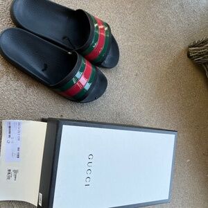 Guaranteed authentic Gucci slides